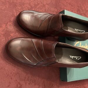NEW! CLARK’S Brown Leather Partridge Shoes 8.5 medium.NEVER worn, comes in box.